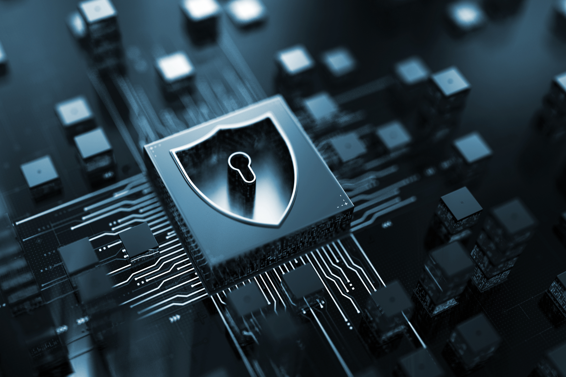 A digital shield icon symbolising cybersecurity on a blue-tinted motherboard with circuits and microchips.